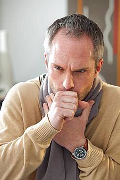 Man coughing