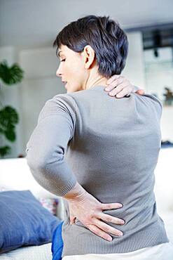 Lower back pain in a woman