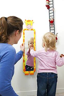 Child with mirror