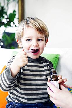 Child taking medication