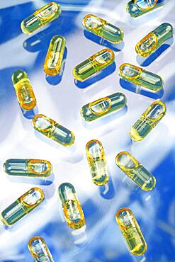 Capsules of cod liver oil. Cod liver oil is consummed mainly for its richness in vitamin A and D, but it also contains omega 3.