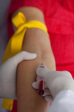 Blood specimen in a woman