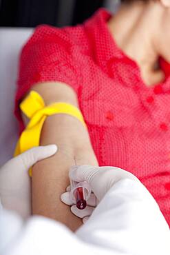 Blood specimen in a woman