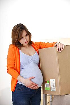 Active pregnant woman indoors