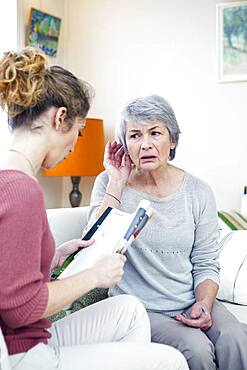 Senior woman with her carer.