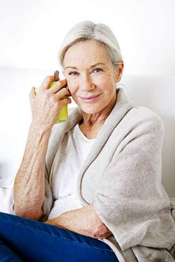 Woman drinking tea.