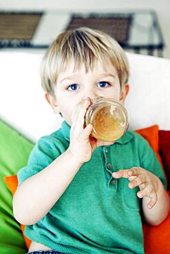 Child with cold drink