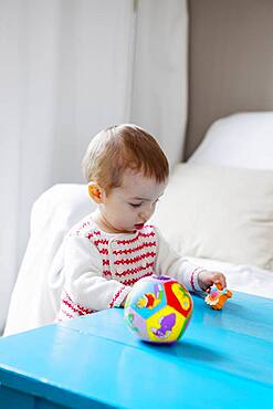 Child playing indoors