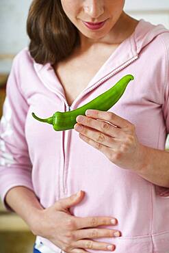 Woman eating spice