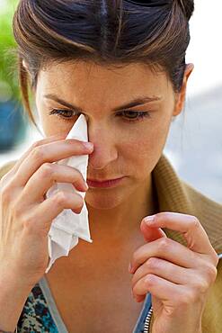 Woman  with rhinitis