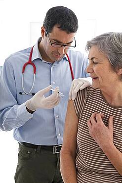 Vaccinating an elderly person