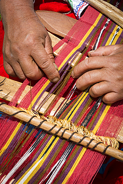 Weaving traditional Quechua cloth in Misminay Village, Sacred Valley, Peru.