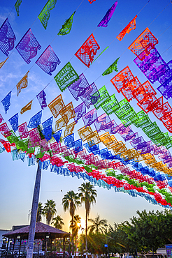 Papel picado flags on the plaza in San Blas, Riviera Nayarit, Mexico.