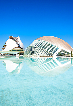 Reflections of Palau de les Arts Reina Sofia (Queen Sofia Palace of the Arts) and Museu de les Ciencies Principe Felipe (Principe Felipe Science Museum) of Ciudad de las Artes y las Ciencias (City of Arts and Sciences), Valencia, Spain, Europe