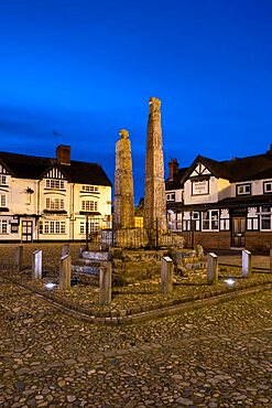 The ancient Saxon Crosses in the Market Place at night, Sandbach, Cheshire, England, UK