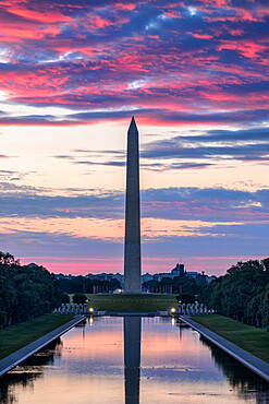 The Washington Monument and Reflecting Pool at sunrise, National Mall, Washington DC, United States of America, North America