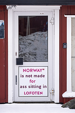 Rorbu cabin door with amusing phrase, Reine, Moskenesoya Island, Moskenes Municipality, Nordland County, Lofoten Islands, Norway, Scandinavia, Europe