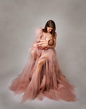 Mother with a baby, studio shot, United Kingdom, Europe