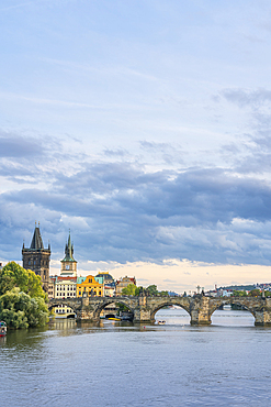 Charles Bridge and Old Town Bridge Tower against sky, UNESCO World Heritage Site, Prague, Bohemia, Czech Republic (Czechia), Europe