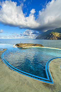 Coastal swimming pools near mountains at Porto da Cruz, Machico District, Madeira, Portugal, Atlantic, Europe