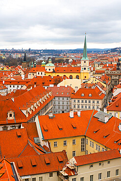 Red roofs of Lesser Quarter dominated by St Thomas church, UNESCO, Prague, Czech Republic