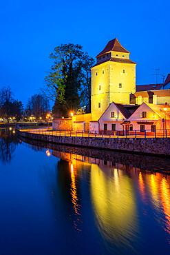 Gothic tower Iron Maiden by Malse river at twilight, Ceske Budejovice, Czech Republic