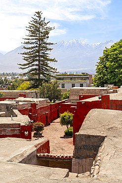 Chachani volcano rising above Santa Catalina Monastery, UNESCO, Arequipa, Peru