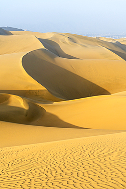 Sand dunes in desert at sunset, Huacachina, Ica District, Ica Province, Ica Region, Peru, South America