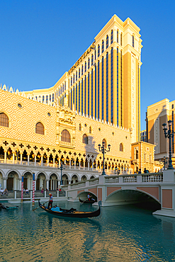 Gondola rides in canal The Venetian Las Vegas Hotel at sunset, Las Vegas Strip, Paradise, Las Vegas Boulevard, Las Vegas, Nevada, USA