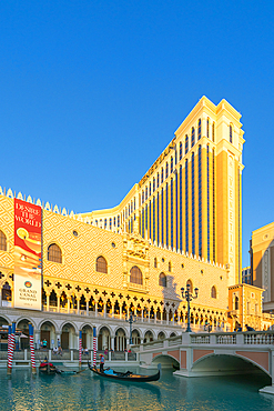 Gondola rides in canal The Venetian Las Vegas Hotel at sunset, Las Vegas Strip, Paradise, Las Vegas Boulevard, Las Vegas, Nevada, USA