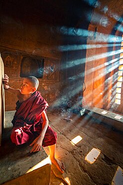 Young monk inside temple, UNESCO, Bagan, Myanmar