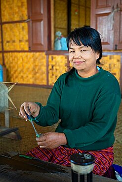 Burmese woman at weaving workshop, Lake Inle, Myanmar