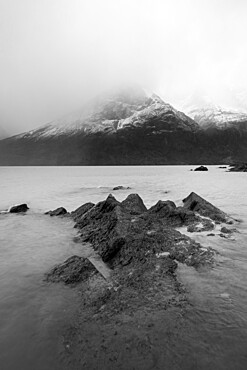 Los Cuernos peaks hiding in fog, Torres del Paine National Park, Patagonia, Chile, South America