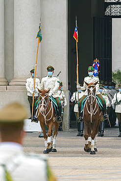 Policemen performing changing of guards ceremony in front of La Moneda Palace, Santiago, Santiago Metropolitan Region, Chile, South America