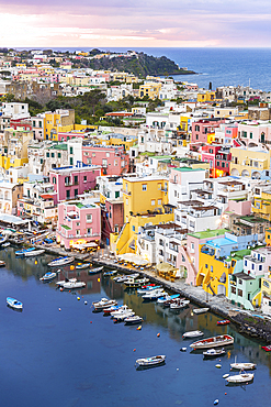 Elevated view of the fishing village of Marina Corricella with colorful houses, Procida island, Tyrrhenian Sea, Naples district, Naples Bay, Campania region, Italy, Europe