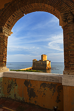 Torre Astura medieval castle seen from an arch made of bricks, Tyrrhenian Sea, Rome province, Latium (Lazio), Italy, Europe