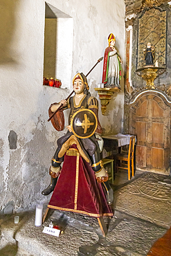 Europe, Portugal, Caminha. April 9, 2022. Statue of a knight in a small chapel in Caminha.