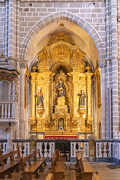 Europe, Portugal, Evora. April 20, 2022. Golden altar in the Church of Saint Francisco.