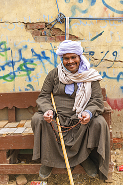 Birqash, Cairo, Egypt. February 18, 2022. Camel handler at the Birqash Camel Market outside Cairo.