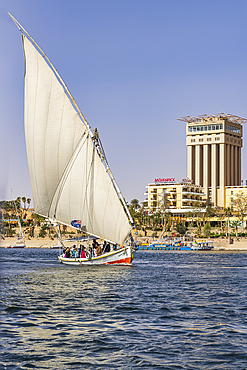 Luxor, Egypt. February 24, 2022. Felucca carrying tourists on the Nile River.