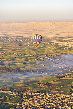 Luxor, Egypt. February 26, 2022. Hot air balloons taking tourist for a ride at Luxor.