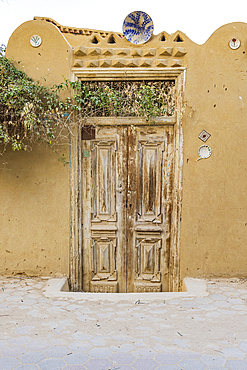 Faiyum, Egypt. Wooden door on a building in the village of Faiyum.