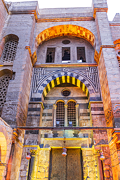 Cairo, Egypt. Entrance to a historic mosque on El Moez street in Old Cairo.