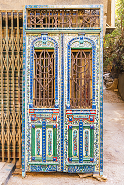 Old Cairo, Cairo, Egypt. Antique wooden doors in an alley in Cairo.