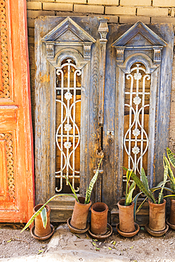 Old Cairo, Cairo, Egypt. Antique wooden doors in an alley in Cairo.