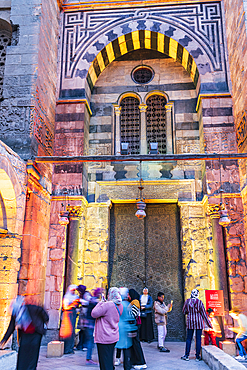 Cairo, Egypt. February 18, 2022. Entrance to a historic mosque on El Moez street in Old Cairo.