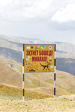 Rabot, Gorno-Badakhshan Autonomous Province, Tajikistan. August 14, 2021. Landmine warning sign on a mountain pass in Tajikistan. Editorial Use Only