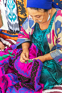 Panjakent, Sughd Province, Tajikistan. August 18, 2021. Craftsperson doing traditional needlework at the Historical Museum in Panjakent. Editorial Use Only