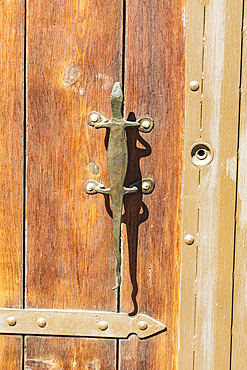 Todos Santos, Baja California Sur, Mexico. Bronze door handle in the shape of a lizard.