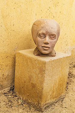 Faiyum, Egypt. February 19, 2022. Ceramic sculpture of a head in the village of Faiyum.